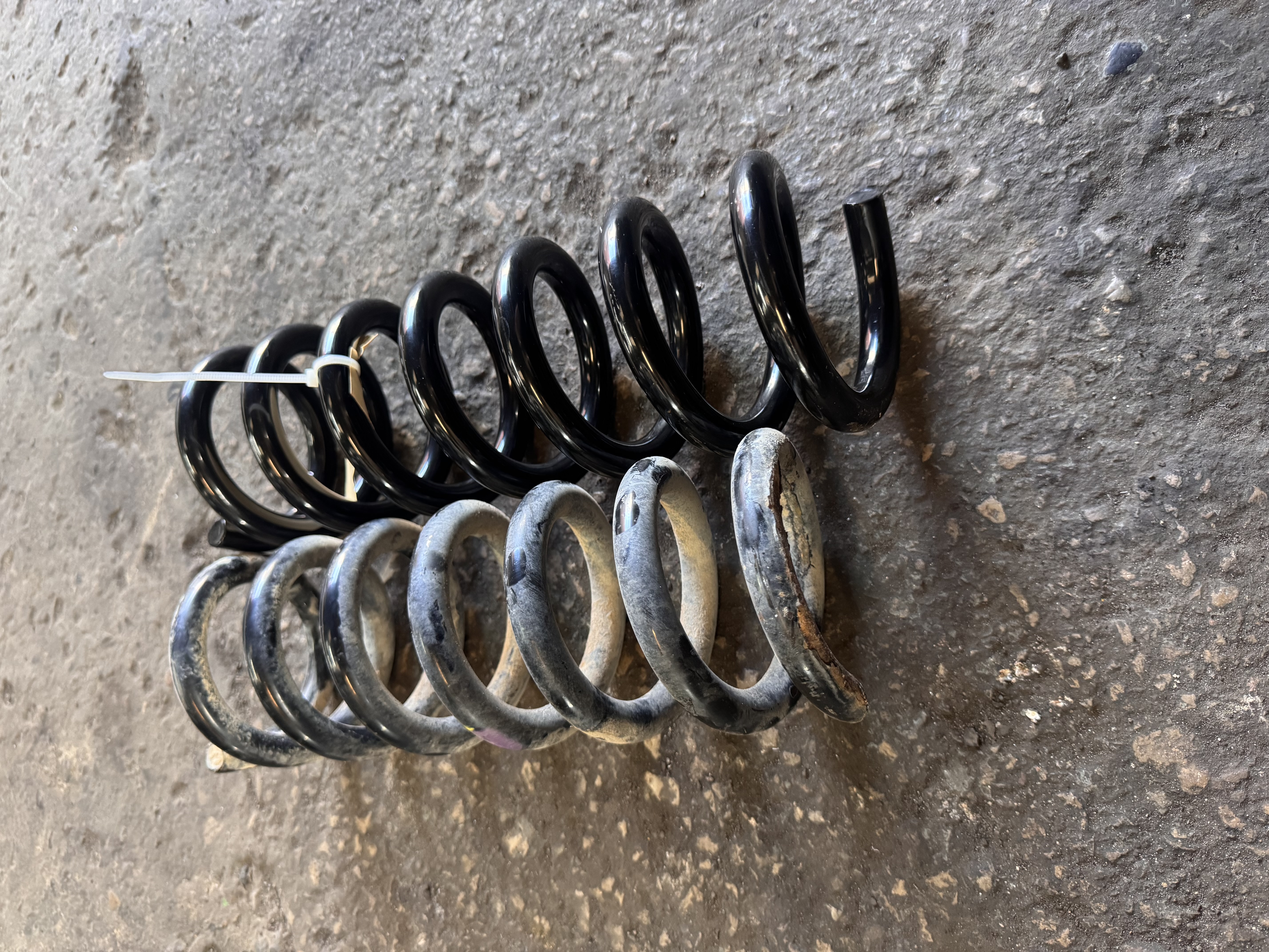 Snapped coil spring replacement on driveway — MOT failure repair Skelmersdale